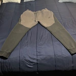 100% real Nike tech few stains but if dry cleaned like brand